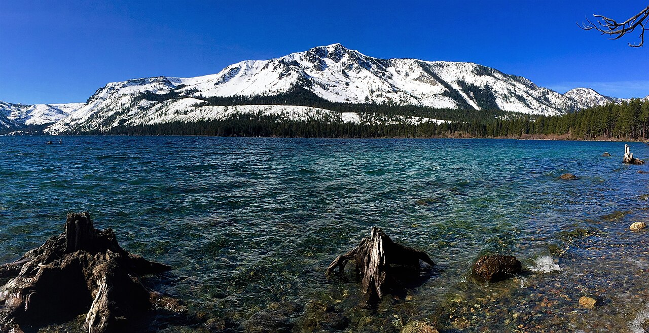 Rocky Fallen Leaf Lake shoreline with snow-covered Mount Tallac across the water in February 2016